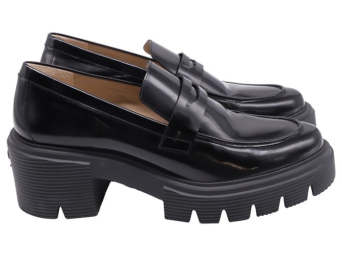 Mocasines Soho Stuart Weitzman en cuero negro