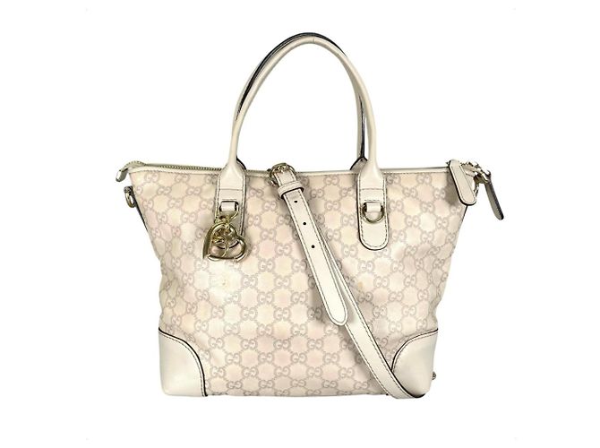Bolsa de ombro e tote em couro bege Gucci