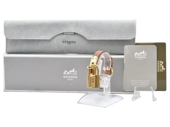 Relógio Hermès Kelly de Cadeado Ouro e Couro Marrom Dourado