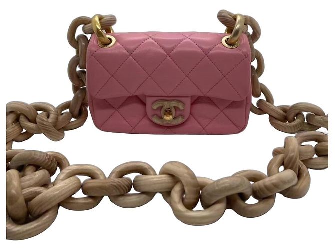Mini bolso Chanel de cordero rosa con cadena de madera