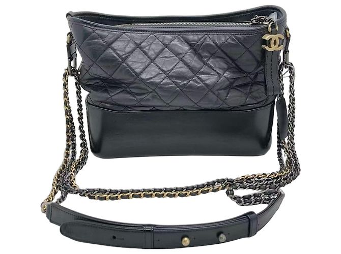 Bolsa Chanel de couro preto com corrente