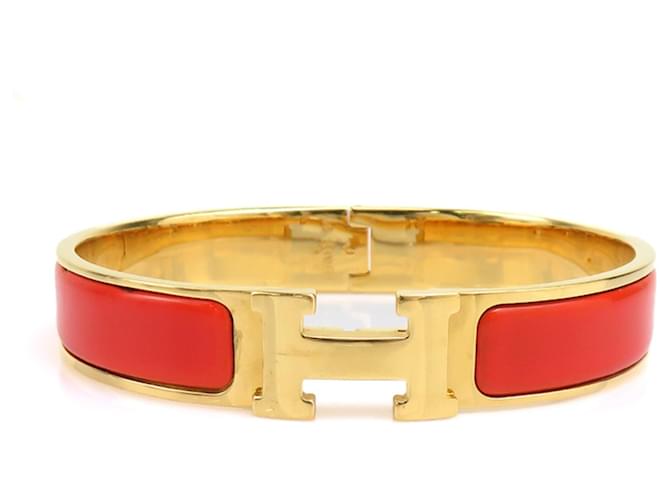 Bracciale Bangle Clic Clack H di Hermès D'oro Arancione 