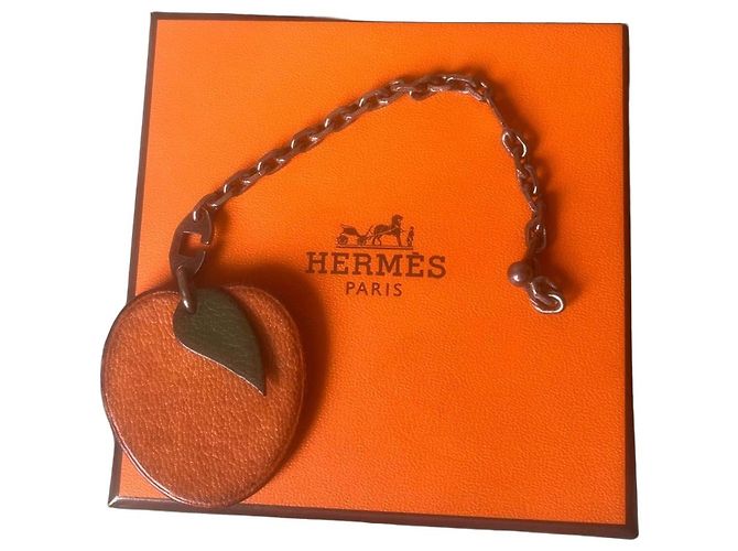 Charm de bolsa Hermès A Laranja em couro corrente prata 