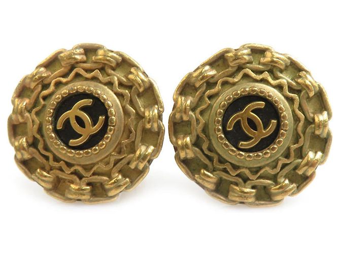 Pendientes de clip de metal dorado Chanel