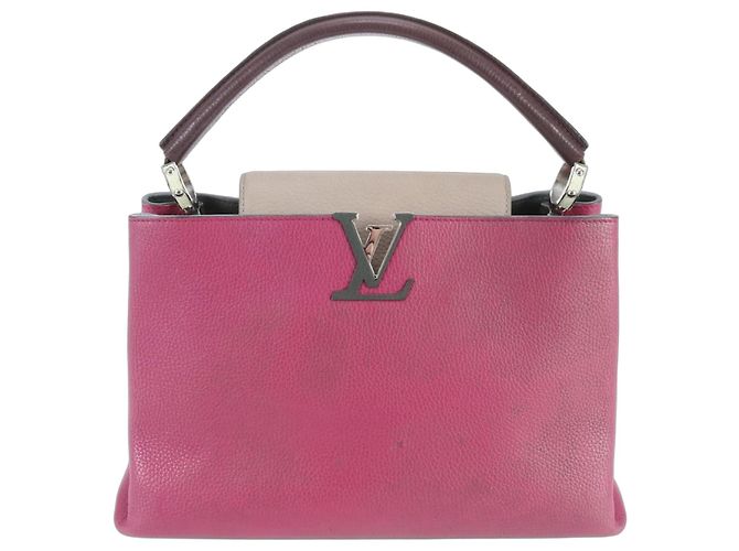 Bolsa Louis Vuitton Capucines MM em couro Taurillon Bege