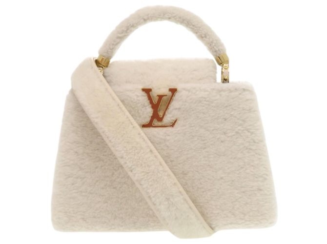 Bolsa Louis Vuitton Capucines BB em pele de cordeiro shearling e couro branco como nova LV VUITTON Marrom