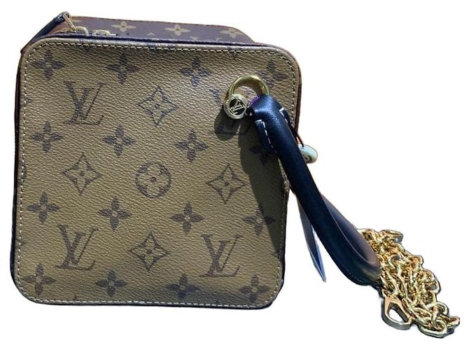 Borsa a dados Louis Vuitton Marrone in Pelle