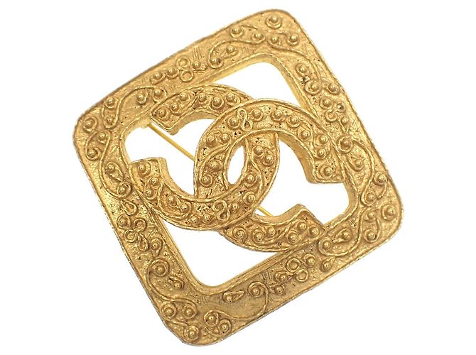 Timeless Chanel Coco Mark Goldplattierte Brosche Golden