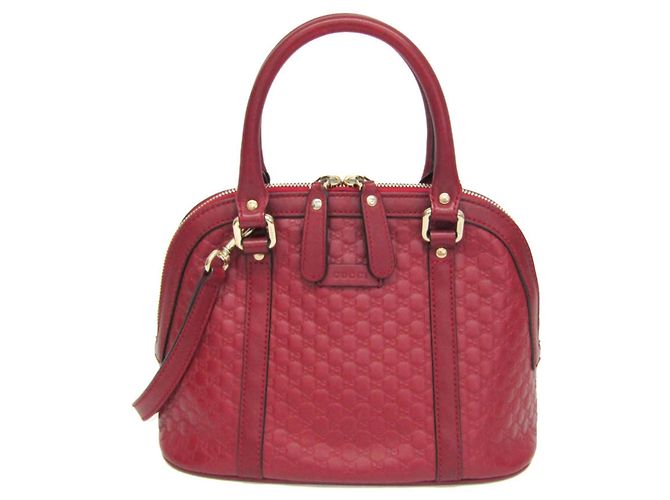 Gucci MicroGuccissima rote Lederhandtasche