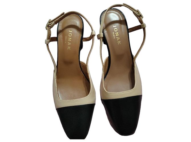Jonak Sandali con tacco in pelle nera e beige Nero