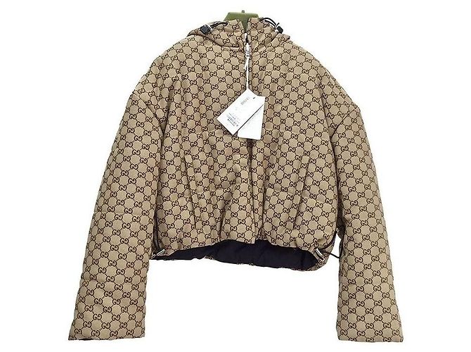 Gucci Jaqueta acolchoada com capuz reversível Marrom