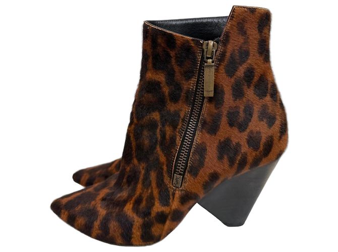 Botines de pelo de ternera con estampado de leopardo Saint Laurent