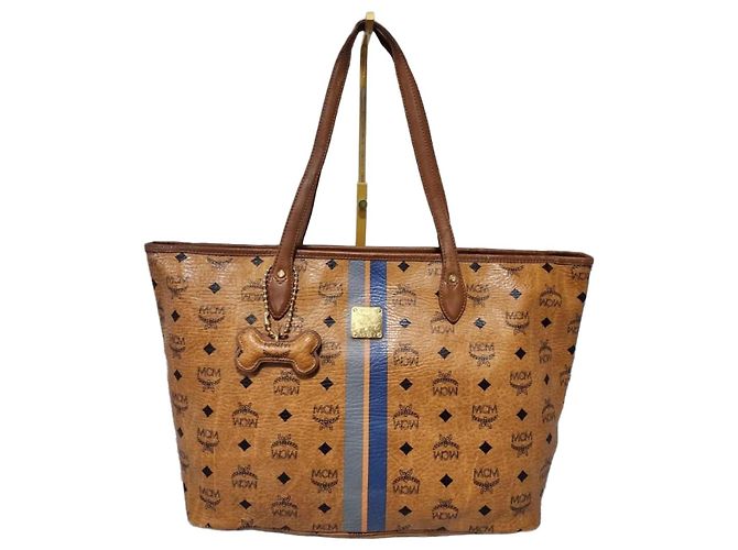 Bolsa tote listrada MCM Visetos em cognac Conhaque