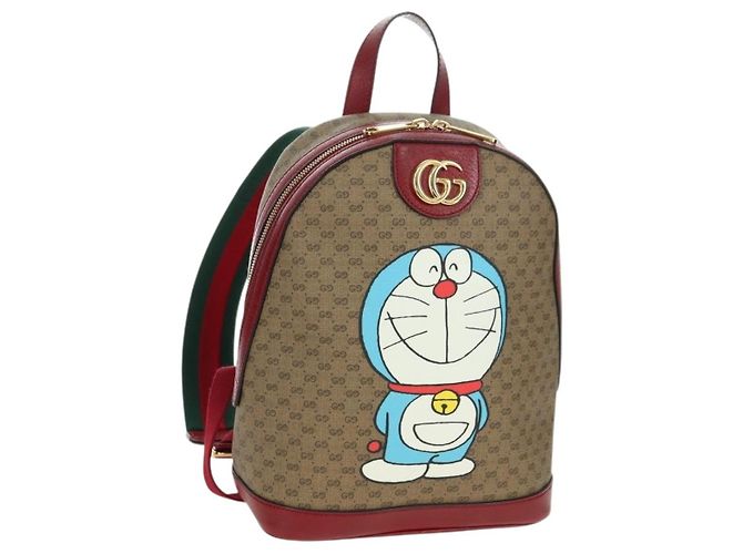 Gucci Mochila Doraemon Micro GG Supreme em PVC bege e dourado 647816 Auth BA12426M