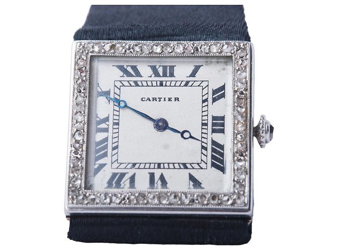 Reloj rectangular Cartier de los años 1920 Art Déco engastado con diamantes Negro