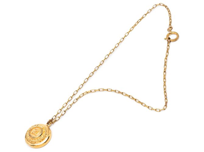 Collier médaillon en plaqué or CC doré de Chanel