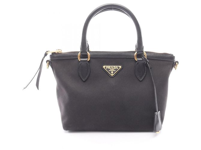 Borsa a mano Prada nera in pelle e tela Nero