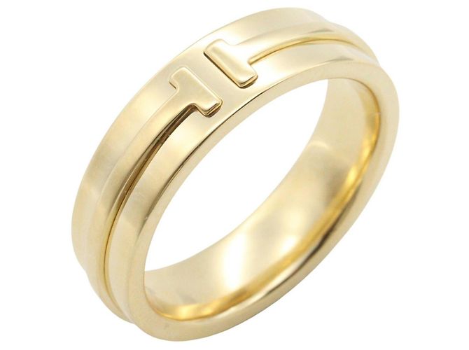 Anello a Banda Stretta T di Tiffany & Co. D'oro