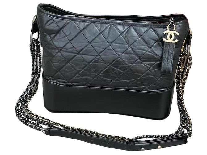 Chanel Medium Schwarze gesteppte Lederhandtasche mit Kette