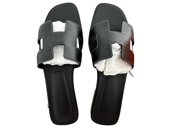 Hermès Oran Leder Sandalen Schwarz