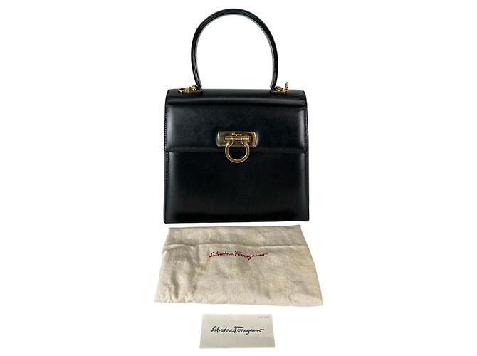 Bolsa de mão compacta em couro Gancini Salvatore Ferragamo