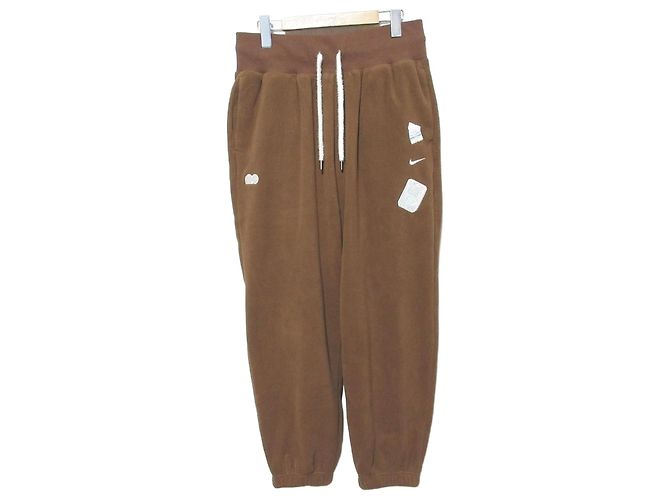 Autre Marque Pantalones Nike Phoenix Fleece Castaño