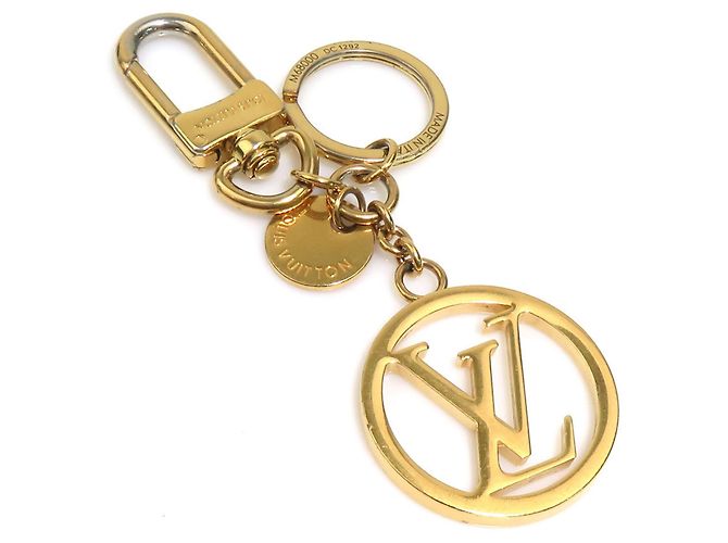 Chaveiro Louis Vuitton dourado