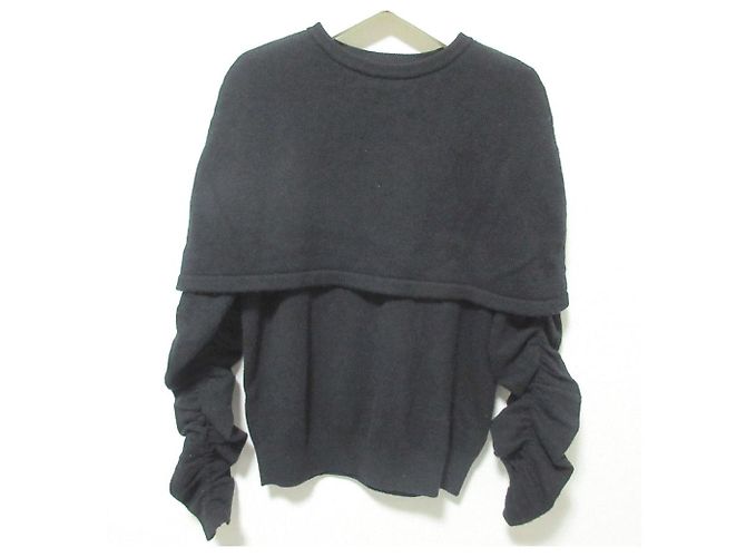 Autre Marque Heve Cape Strickpullover mit Rüschen Schwarz
