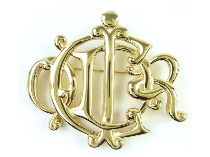 Spilla emblema Christian Dior D'oro