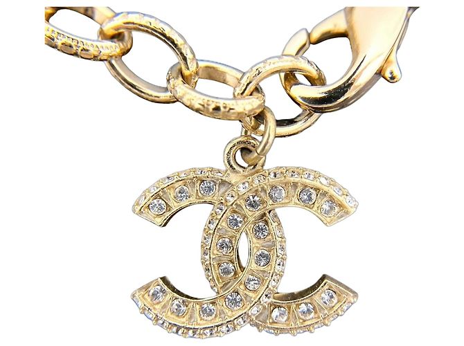 Pulsera de charms Chanel chapada en oro