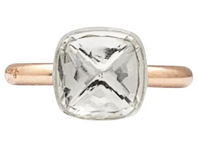 Anello Pomellato, "Nudo Classique", due ori e topazio bianco.