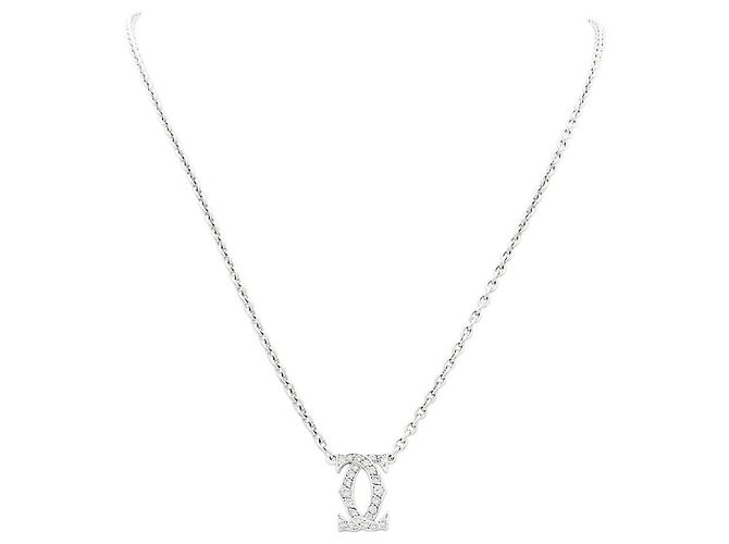Collana Cartier, "Double C", oro bianco e diamanti.