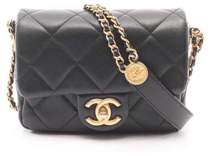 Borsa a tracolla Chanel Matelassé Mini Flap in nero