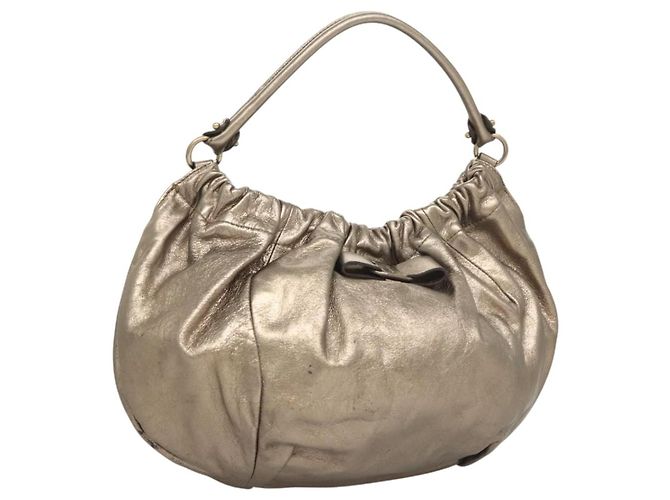 Salvatore Ferragamo Vala Leather D'oro