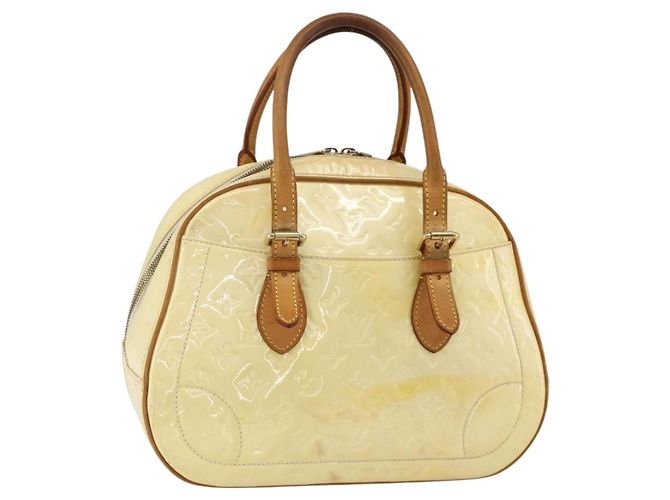 Louis Vuitton Summit Drive Monogram Vernis Jaune