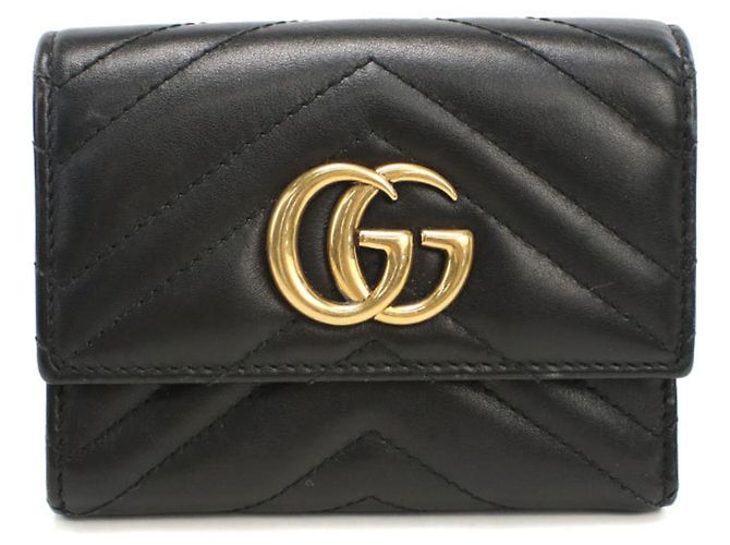 Cartera tríptico Gucci en negro