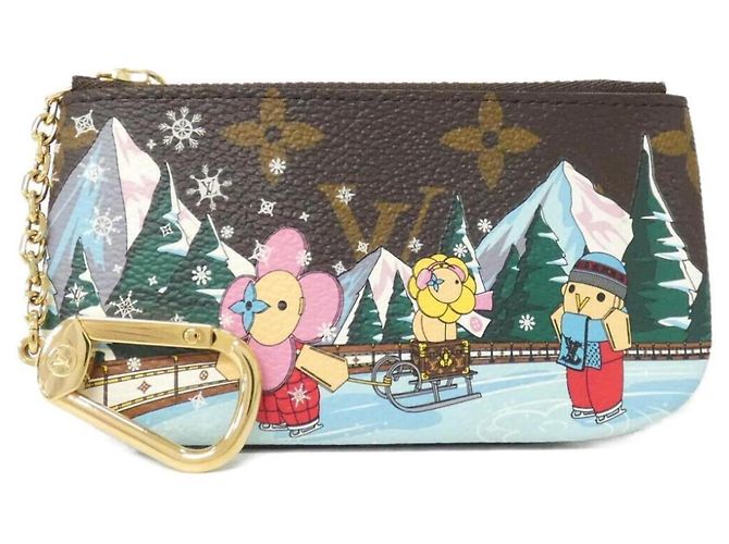 Vivienne Louis Vuitton Monogram Pochette Clé Brown