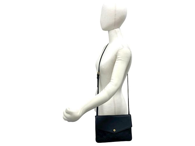 Bolsa de ombro Louis Vuitton Twice em couro Monogram Empreinte Preto