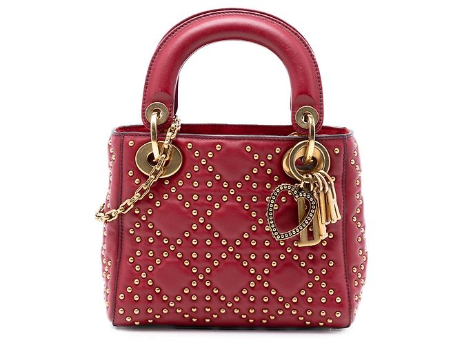 Lady Dior Supple in agnello rosso mini con cannage e borchie