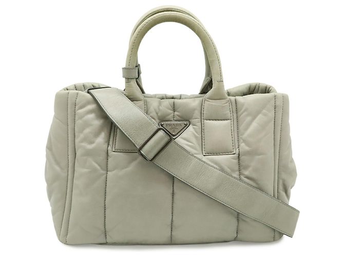 Bolsa Tote Bomber de Nappa Prada em cinza claro