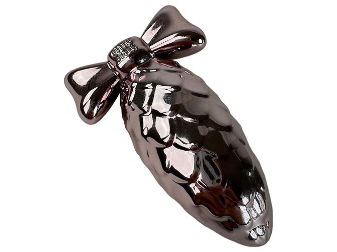 Objeto decorativo Miu Miu de metal rosa en forma de lazo