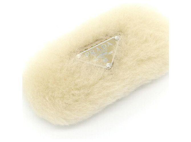 Clip per capelli in shearling beige Prada