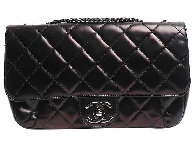 Chanel Bolsa flap acolchoada em pele de cordeiro preta 2015 Preto