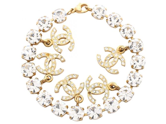 Pulseira com berloque Chanel Coco Mark Dourado