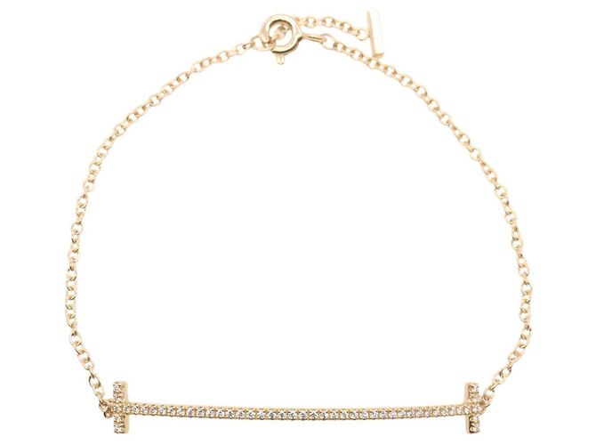 Bracciale Tiffany & Co. T Smile con diamante D'oro