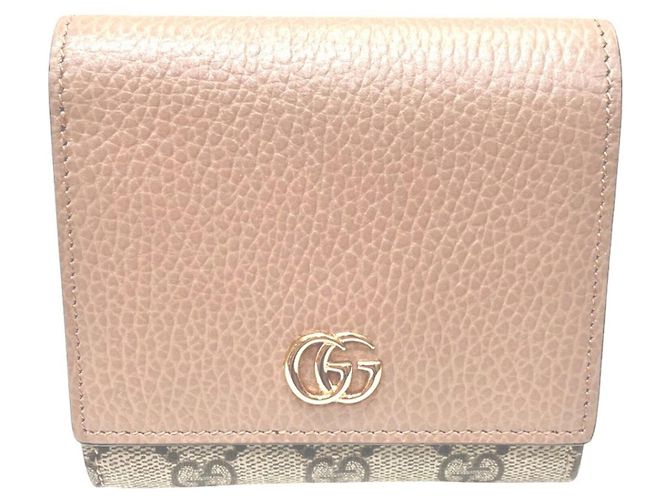 Gucci Bi-fold Wallet in Beige Leather