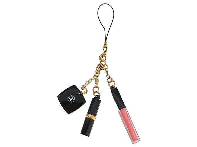 Set Charms Chanel Nero e Oro D'oro