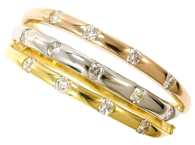 Autre Marque Elegante fede in oro e platino D'oro
