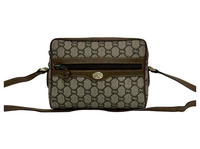 Mini bolsa de ombro em couro marrom Gucci