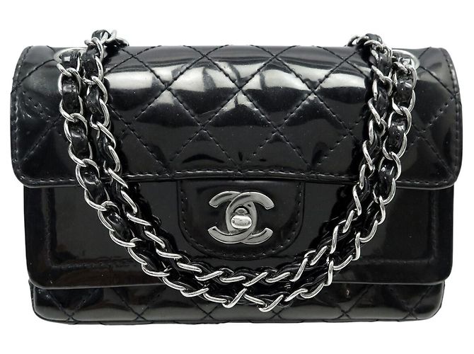 Timeless BORSA CHANEL MINI CLASSIC DOUBLE FLAP IN PELLE NERA MATELASSÉ Nero